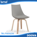 Fashion design plastic chair with wooden legs